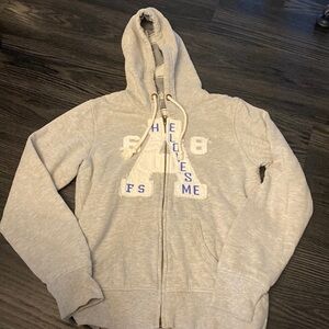 🍍FREE SPIRIT ZIP UP HOODIE JACKET 🍍SIIZE MEDIUM 🍍
Pit to pit 18”
Length 23”